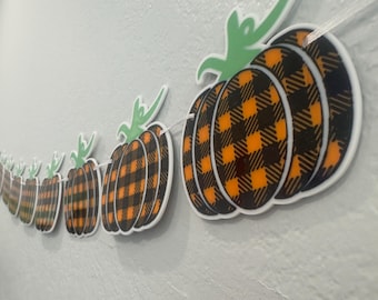 Banderín de calabaza a cuadros con 10 estrellas holográficas brillantes