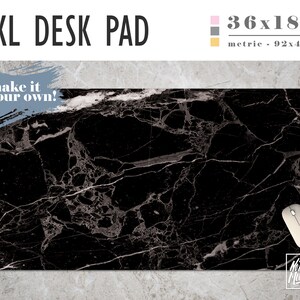 May include: Black marble desk pad with a white marble pattern. The pad measures 36x18 inches. The text "make it your own!" is in a white box on the top left corner of the pad. A computer mouse is on the bottom right corner of the pad.