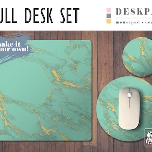 May include: A teal and gold marble desk pad set with a matching mousepad and coaster. The desk pad features a "make it your own!" text overlay. The mousepad has a white computer mouse on top of it. The coaster has the text "No Bad Mondays" on it.