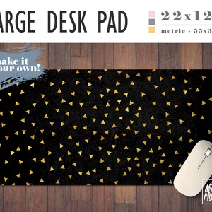 May include: Black desk pad with a gold triangle pattern. The desk pad measures 22x12 inches. The text "make it your own!" is in the top left corner. The text "No Bad Mondays" is in the bottom right corner.