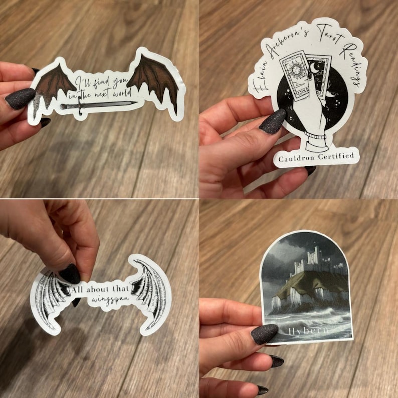 May include: Four different stickers featuring black and white illustrations of wings, a castle, and tarot cards. The stickers have text that reads "I'll find you in the next world", "All about that wingspan", "Elain Archeron's Tarot Readings Cauldron Certified", and "Hybern".