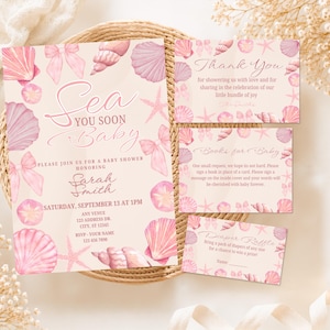 May include: A set of baby shower stationery featuring a light pink and cream color palette with watercolor illustrations of seashells, starfish, and bows. The text includes Sea You Soon Baby, Thank You, Books for Baby, and Diaper Raffle details.
