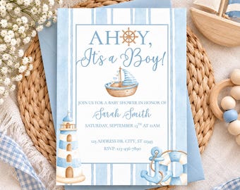 May include: A rectangular baby shower invitation card featuring a light blue and white striped background. The text reads: AHOY, It's a Boy! JOIN US FOR A BABY SHOWER IN HONOR OF Sarah Smith SATURDAY, SEPTEMBER 13TH AT 11AM 123 ADDRESS DR. CITY, ST 12345 RSVP: 123-456-7890. Illustrations include a lighthouse, a sailboat, a ship wheel, and an anchor with a life preserver.