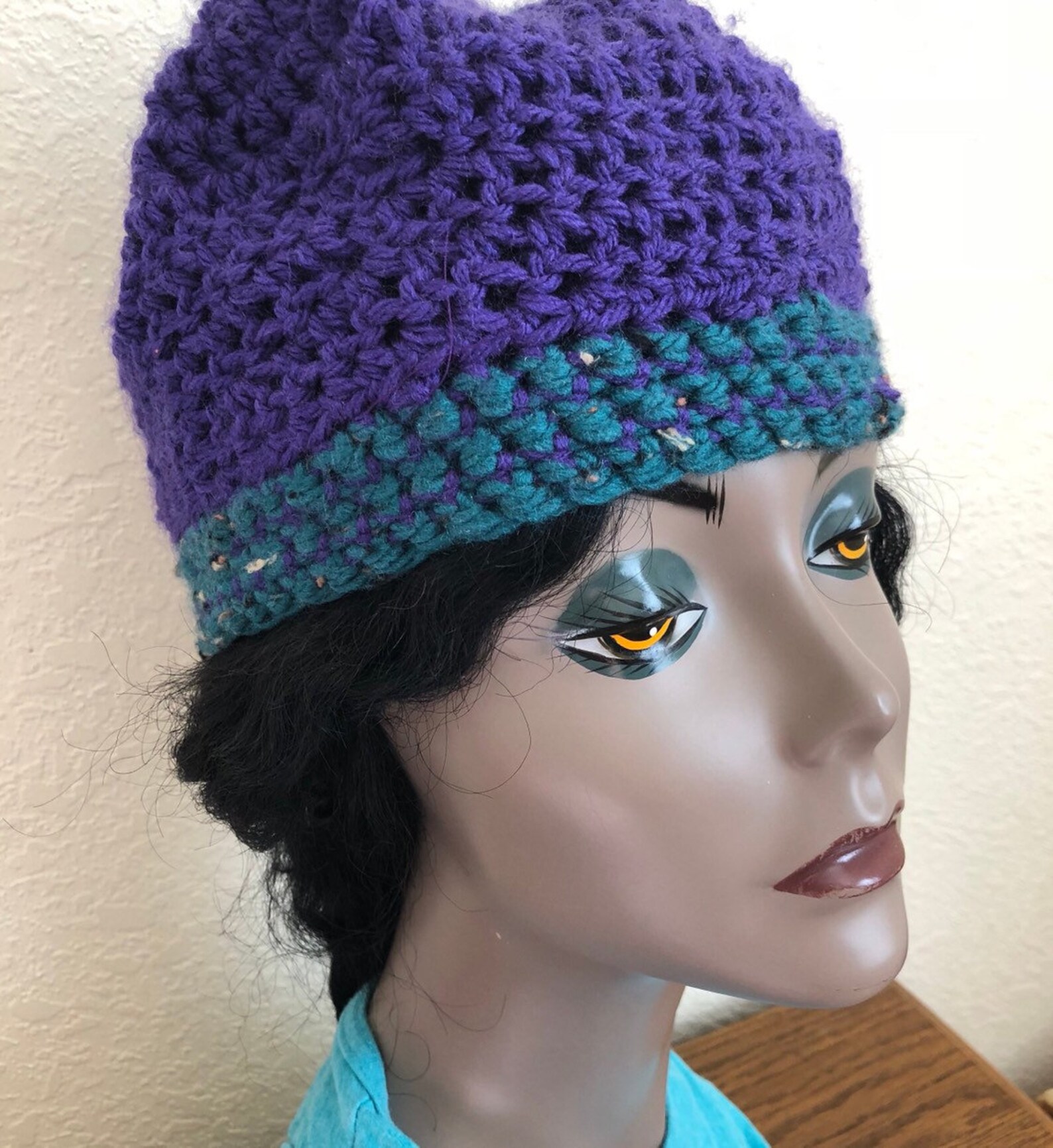 purple beanie with eye