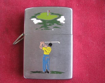 Unfired 1962 Lossproof Zippo Lighter Two-Panel Golfer and the Green