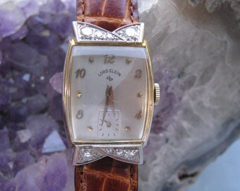 Vintage Elgin De Luxe 17 Jewel 10k Gold Filled Mechanical  display picture 1