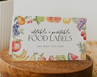 May include: Editable and printable food labels with a watercolor design featuring a variety of fruits, including apples, bananas, strawberries, grapes, and pineapples. The text on the label reads "editable + printable FOOD LABELS" and "ADD MORE TEXT HERE".