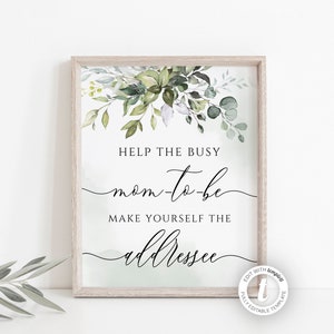 May include: A printable sign with a green floral design and the text "Help the busy mom-to-be make yourself the addressee".