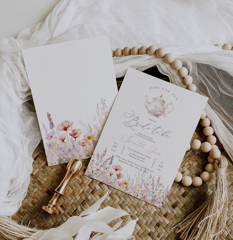 May include: A watercolor floral design with a teapot and the text "Time for Tea" and "Bride-to-be" with the name "Samantha Jones" on a white background. The text "The Hemingway Home" and "August 23, 2021 at 12 PM" is also included.