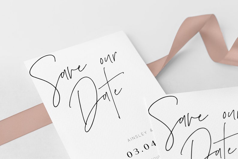 May include: Save the Date card with a handwritten script font. The card is white with a pink ribbon on top. The date is 03.04 and the names Ainsley & are printed below the date.