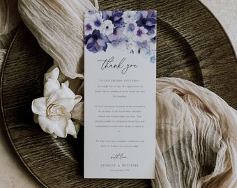 May include: A thank you card with a watercolor floral design in shades of purple and blue. The text reads "Thank you to our friends and family. We would like to take this opportunity to thank you for coming as we begin our new life together. We feel extremely fortunate to be surrounded by so many of our loved ones who have shared and helped shape our lives. Your presence today in celebration of our love and commitment to each other means so much to us. We hope you enjoy tonight's celebration and those we share for years to come. With love, Ainsley & Michael, 2nd September 2024."