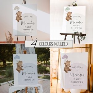 Puede incluir: Cuatro carteles de bienvenida para un baby shower con un oso sosteniendo globos. Los carteles son de cuatro colores diferentes: azul, verde, morado y rosa. El texto en los carteles dice "Bienvenido al baby shower de Miranda".