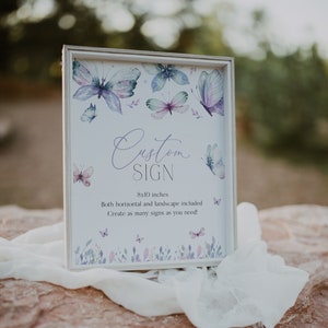 Puede incluir: Un cartel blanco con un dise&ntilde;o de mariposa de acuarela. El cartel dice "Custom Sign" y "8x10 pulgadas". Tambi&eacute;n dice "Both horizontal and landscape included" y "Create as many signs as you need!"