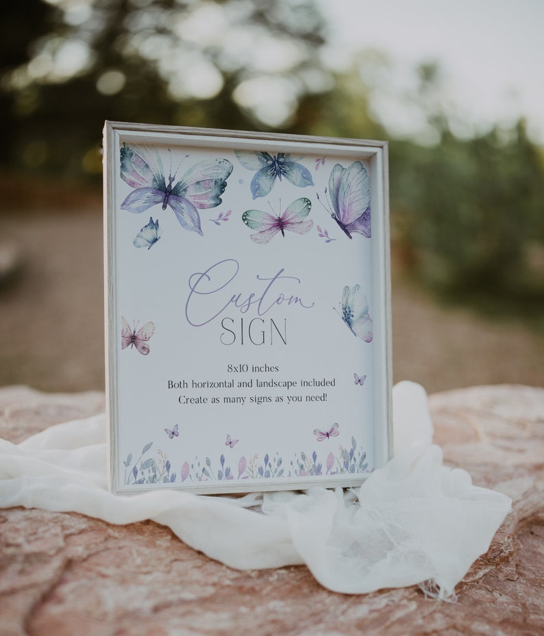 Puede incluir: Un cartel blanco con un dise&ntilde;o de mariposa de acuarela. El cartel dice "Custom Sign" y "8x10 pulgadas". Tambi&eacute;n dice "Both horizontal and landscape included" y "Create as many signs as you need!"