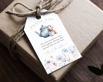May include: A white thank you tag with a blue teapot and a brown teddy bear holding a teacup. The tag has a floral border and the text "THANK YOU for your kindness, love and support during this special time in our lives Love, Samantha"