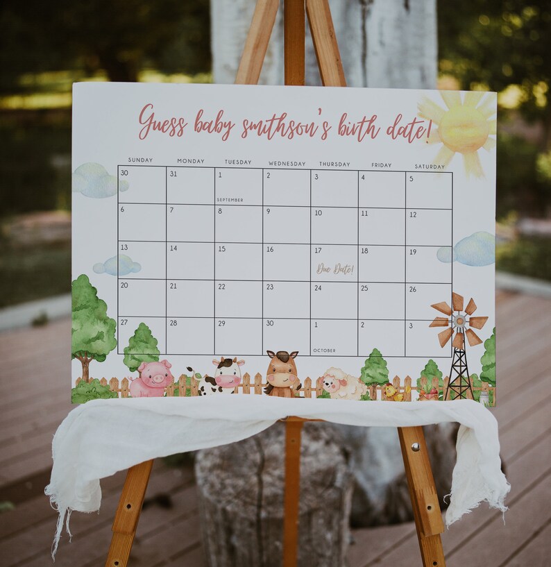 May include: A white calendar with a farm theme. The calendar is set up to guess a baby's birth date. The due date is marked on September 17th. The calendar has a watercolor background with farm animals and a windmill.