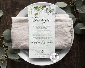 May include: A wedding thank you card with a green and white floral design. The text reads "Thank you to our family and friends, it means the world to us to have you here. Thank you for all the support, encouragement, love and laughter you have contributed to our lives. You are our mentors, teachers, guides and favorite people in the world. We are so glad that you are able to join us on our first day as husband & wife. We hope you enjoy tonight's celebration and those we'll share for years to come. Ainsley + Michael 03.07.2019."