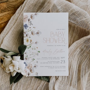 May include: A baby shower invitation with a floral design in shades of blue, pink, and green. The text reads "Join us for a Baby Shower honoring the mommy-to-be Ainsley Smithson Saturday, August 23rd, 20XX from 1-4 o'clock in the afternoon The Smithson Home 100 Wantirna Road, California Sept 23 Kindly respond by the 1st of September to Ainsley on 555-555-5555 registered at shop"