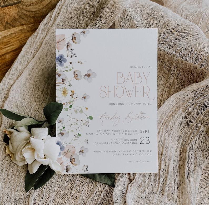 May include: A baby shower invitation with a floral design in shades of blue, pink, and green. The text reads "Join us for a Baby Shower honoring the mommy-to-be Ainsley Smithson Saturday, August 23rd, 20XX from 1-4 o'clock in the afternoon The Smithson Home 100 Wantirna Road, California Sept 23 Kindly respond by the 1st of September to Ainsley on 555-555-5555 registered at shop"