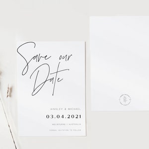 May include: Save the date card with a handwritten script font that says "Save our Date". The card also includes the names Ainsley & Michael, the date 03.04.2021, the location Melbourne | Australia, and the text "Formal Invitation to Follow".