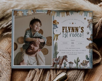 May include: A blue and brown invitation for a child's first rodeo party. The invitation features a photo of a child and his father, along with illustrations of cowboys, horses, cacti, and boots. The text on the invitation reads "Saddle Up & Join Us For Flynn's 1st Rodeo!" and includes the date, time, and location of the party.