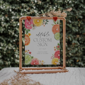 May include: Editable custom sign with a citrus theme. The sign is 5.7" x 8.10" and features watercolor illustrations of lemons, limes, and grapefruits. The text on the sign reads "editable custom sign 5.7" x 8.10" create as many signs as you need".