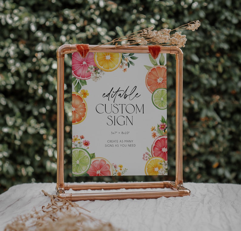 May include: Editable custom sign with a citrus theme. The sign is 5.7" x 8.10" and features watercolor illustrations of lemons, limes, and grapefruits. The text on the sign reads "editable custom sign 5.7" x 8.10" create as many signs as you need".