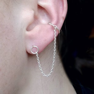 Earrings on attached earlobes deals
