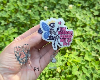 The Horrors Persist But So Do I Badge Reel, Skeleton ID Holder Nurse Badge Reel, Sarcastic Badge Reel, Humorous Badge Reel, Skull Reel.