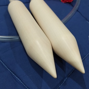 US 80 size 40 mm, US 70 size 35 mm. Giant wooden needles for extreme knitting. Big circular knitting needles with silicone tube.