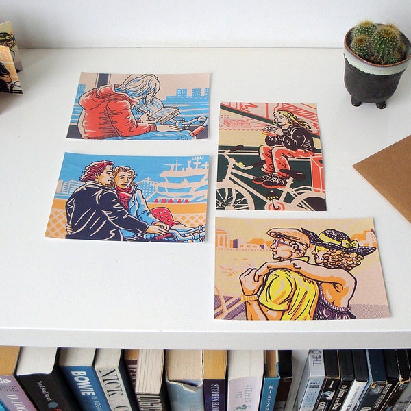 Set of 12 Seasonal Postcards. Faces on the Ferry: Unique artwork made in and about Amsterdam.