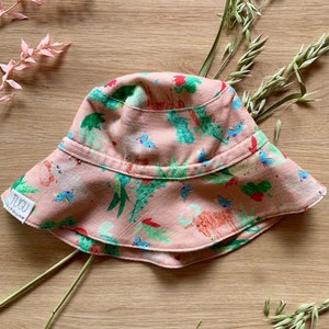 Stay Put Sun Hat Handmade For Baby Girl In Cotton & Linen. Safari Animal Theme Infant Beach Hat For Summer In Pastel Pink. Baby Girl Gift. image 1