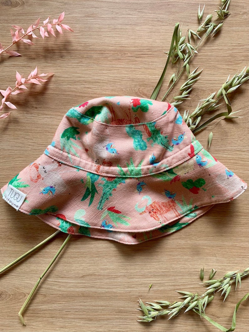 Stay Put Sun Hat Handmade For Baby Girl In Cotton & Linen. Safari Animal Theme Infant Beach Hat For Summer In Pastel Pink. Baby Girl Gift. image 1