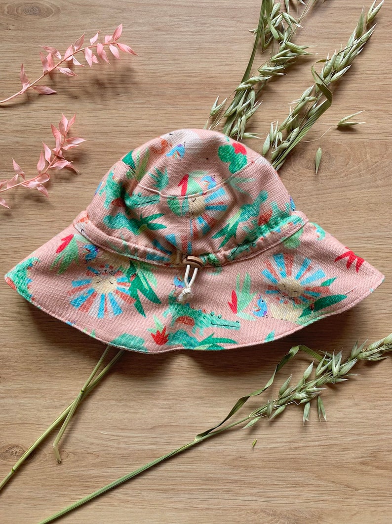 Stay Put Sun Hat Handmade For Baby Girl In Cotton & Linen. Safari Animal Theme Infant Beach Hat For Summer In Pastel Pink. Baby Girl Gift. image 2