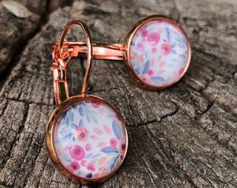 Pendientes de oro rosa con delicadas flores