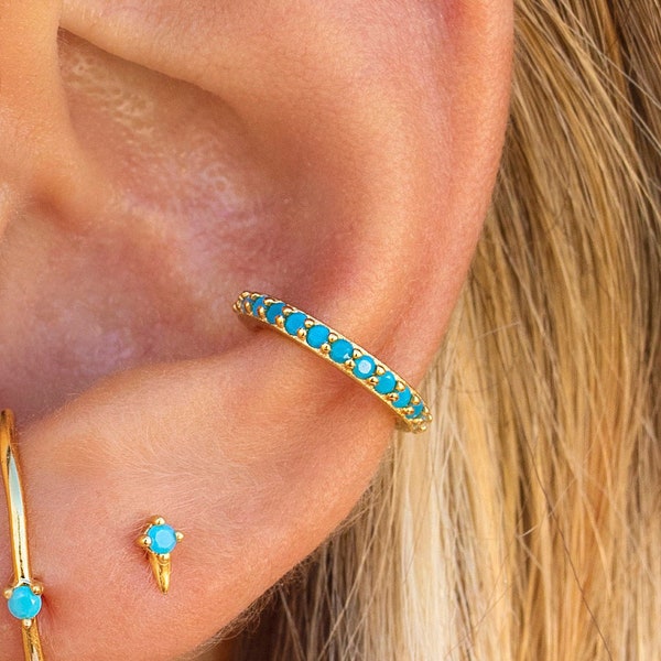 Orecchini ear cuff a conchiglia con zirconi turchesi