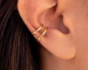 Pendientes conch ear cuff de una banda de plata lisa