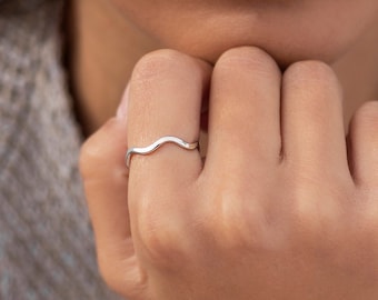 Thin silver ring with waves