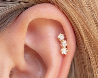 Small star-shaped earrings with 3 cubic zirconia stones