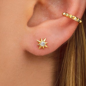 Pendientes stud de estrella de 8 puntas con circonita
