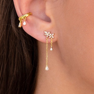 Boucles d'oreilles à tige en forme de fleur avec zircons taille marquise et chaînes pendantes avec zircons taille larme