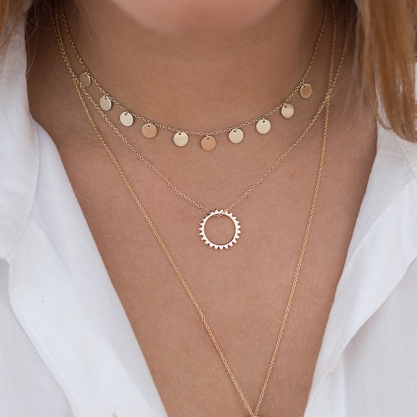 Collar con colgante en forma de sol