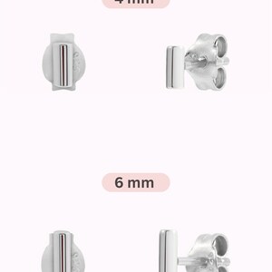 May include: Two pairs of silver bar stud earrings. The earrings are shown in two sizes: 4 mm and 6 mm. The earrings are simple and elegant.