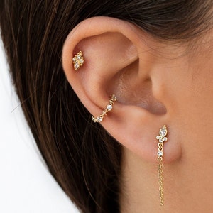 Pendientes stud con circonitas en talla redonda y marquesa con bolitas imagen 5