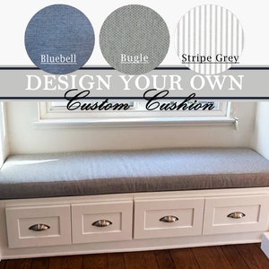 May include: A custom cushion for a window seat with four white drawers underneath. The image displays three fabric swatches labeled Bluebell, Bugle, and Stripe Grey. The text reads DESIGN YOUR OWN Custom Cushion above the long gray seat cushion.