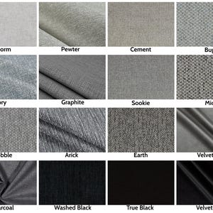 May include: A collection of fabric swatches in various shades of gray and black. Each swatch is labeled with a name, including "Storm," "Pewter," "Cement," "Bugle," "Tory," "Graphite," "Sookie," "Mica," "Cobble," "Arick," "Earth," "Velvet Mica," "Charcoal," "Washed Black," "True Black," and "Velvet Black."