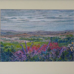 May include: A colourful landscape painting depicting a valley and hills in the distance. The foreground features a field of purple and pink flowers.