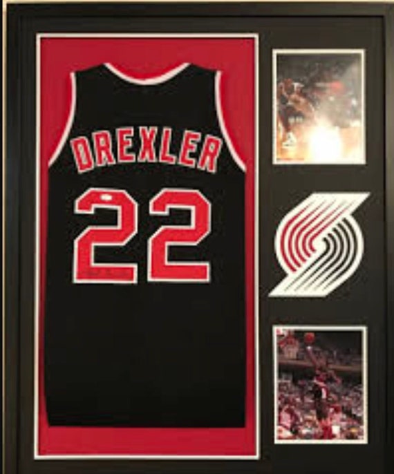 PORTLAND TRAIL BLAZERS CLYDE DREXLER AUTOGRAPHED RED JERSEY JSA