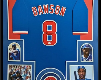 May include: A framed blue baseball jersey with the name "DAWSON" and the number "8" on the back. The jersey is signed by the player. The frame includes three smaller photos of the player in action.