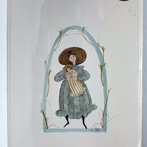 May include: A watercolor painting of a woman in a blue dress and a straw hat holding a doll. The woman is standing in a blue and green archway with yellow flowers.